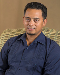 Dr. Alex Racelis