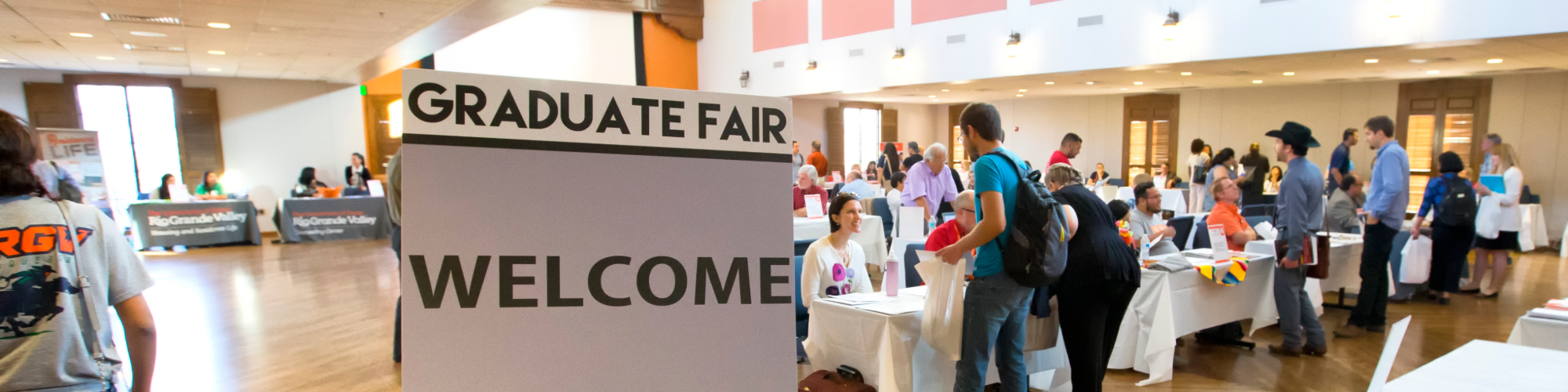 Sign for graduate fair at a graduate recruitment event.