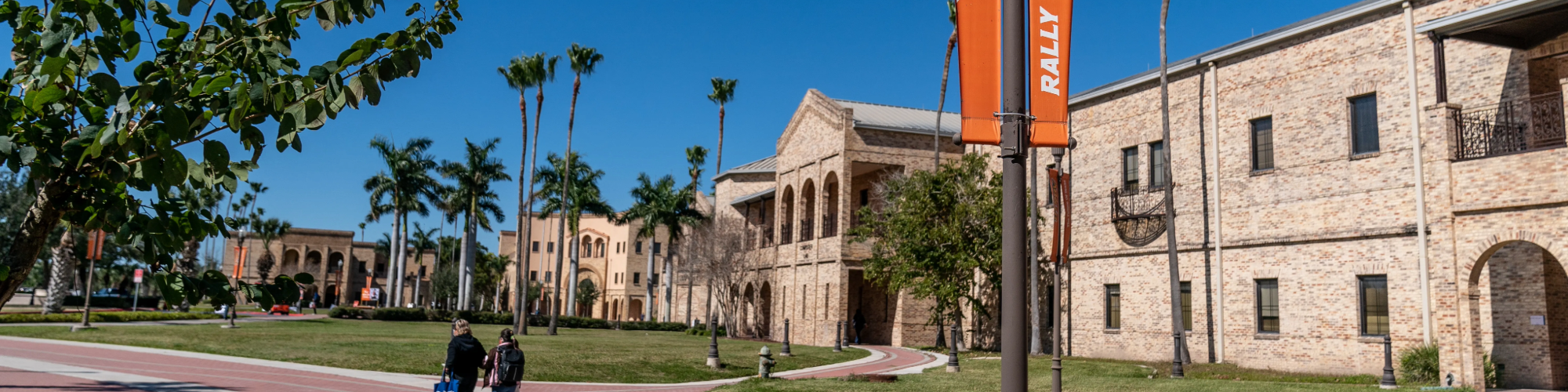 Lamp post on campus with UTRGV banner.