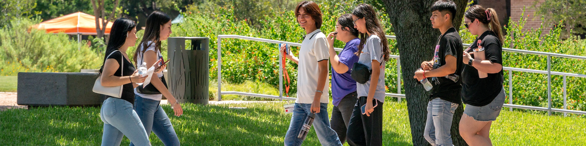 Students walking outside on campus.