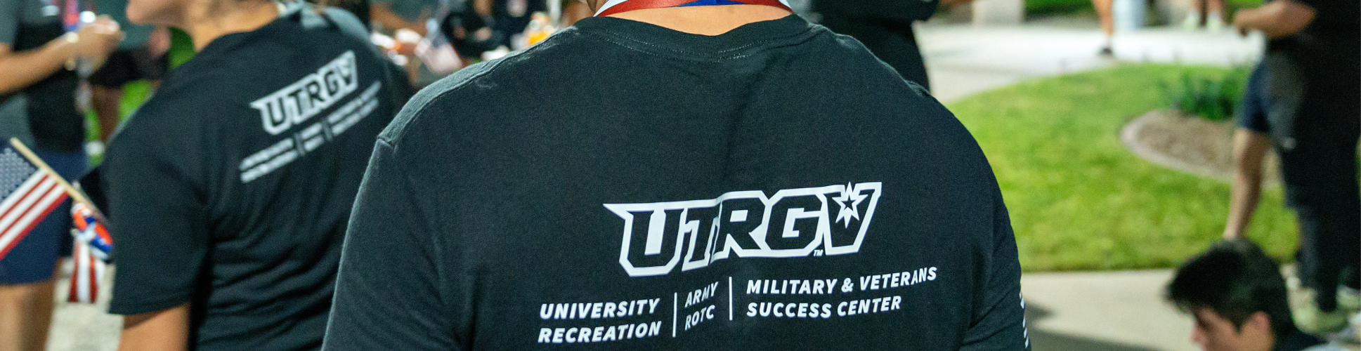 Back of person in a crowd of people.