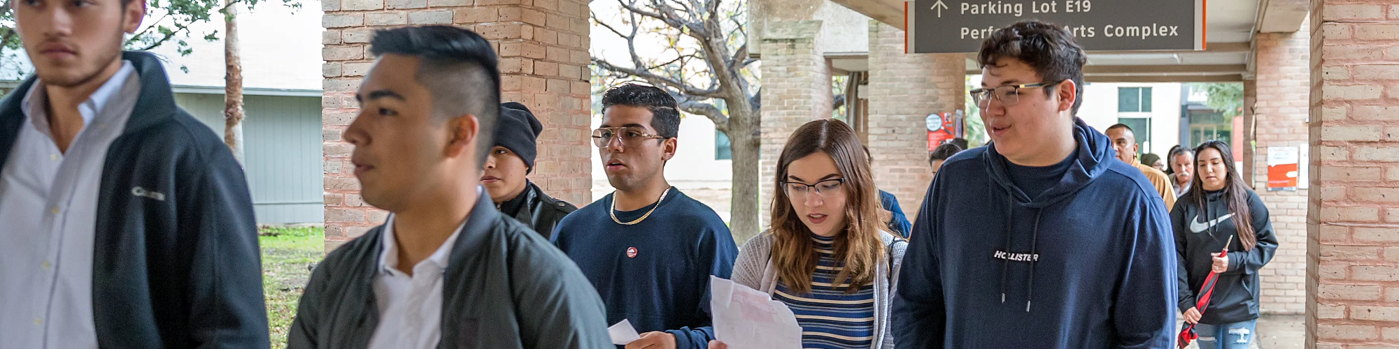 Students walking outside on UTRGV campus.