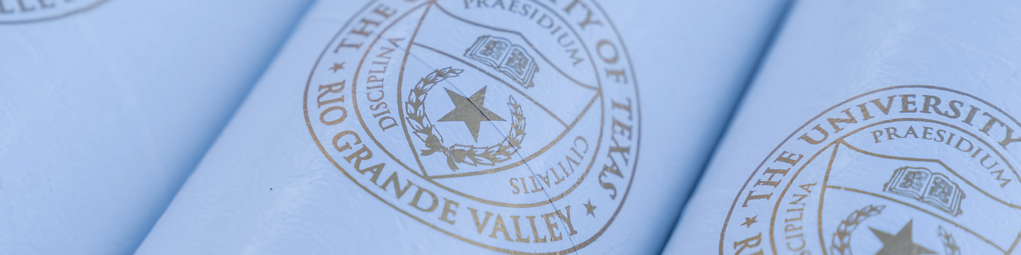 UTRGV diplomas in tubes.