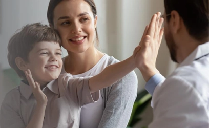 Doctor High-fives young kid