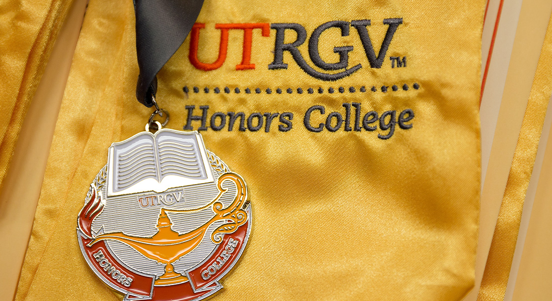 Graduation stole with the Honors College logo and medallion