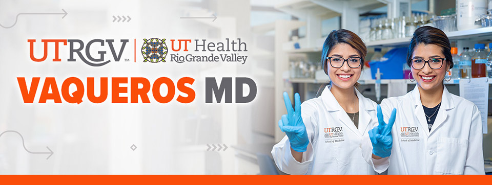 Two medical students wearing UTRGV School of Medicine lab coats