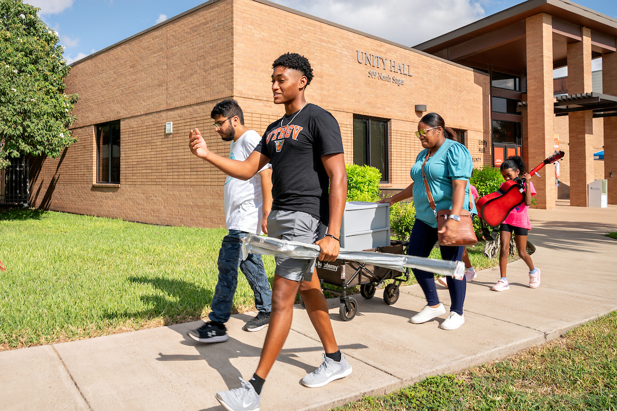 Students move into their dorm room at Unity Hall