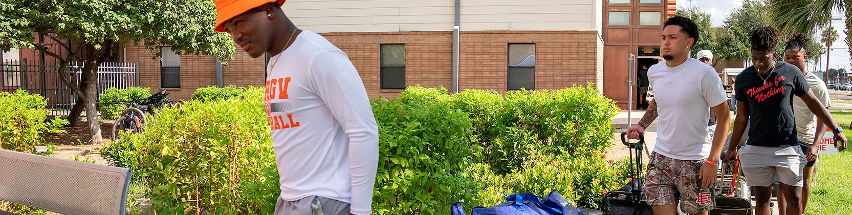students moving in to campus housing