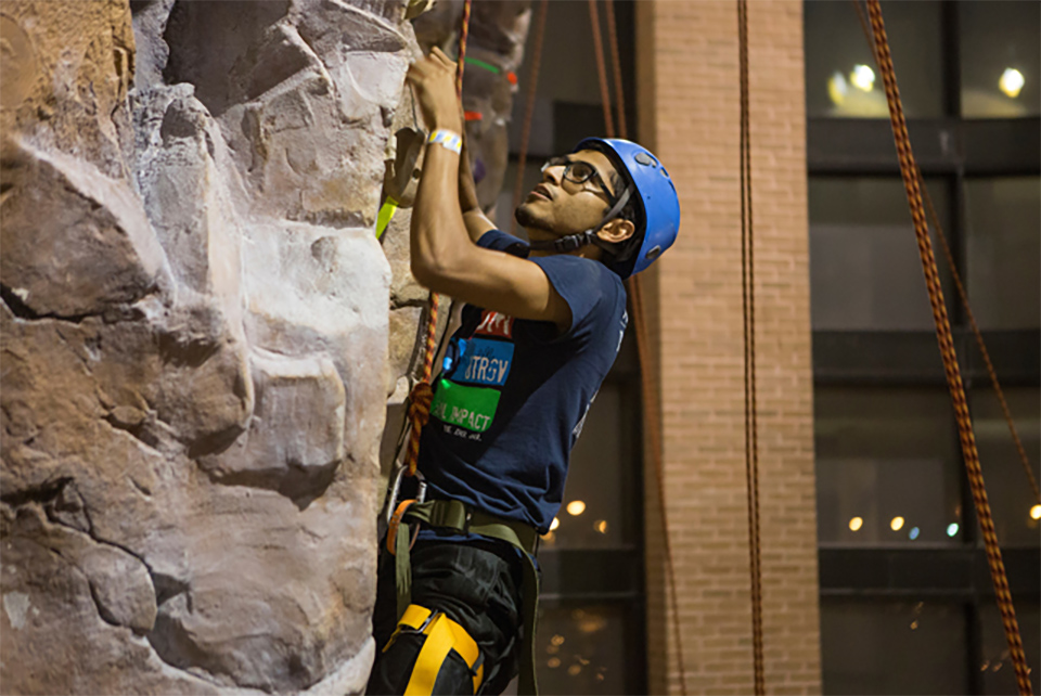 Students can compete in events at the Edinburg URec like the Climbing Wall Challenge, shown here, where they complete various activities and games to win T-shirts and prizes. (UTRGV Archive Photo by Silver Salas)