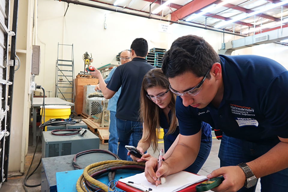UTRGV students participating in the South Texas Industrial Assessment Center, housed in the university’s College of Engineering and Computer Science, are helping local manufacturers save money by assessing their operations on site and recommending ways to save energy and optimize processes. Here, Linda Navarro, a UTRGV senior majoring in civil engineering, and Jesus Leal, a UTRGV senior majoring in manufacturing engineering, evaluate a manufacturing business during an on-site assessment of operations. The UTRGV STIAC is the only one in the UT System and only one of two in Texas. (UTRGV Photo by Maria Elena Hernandez)