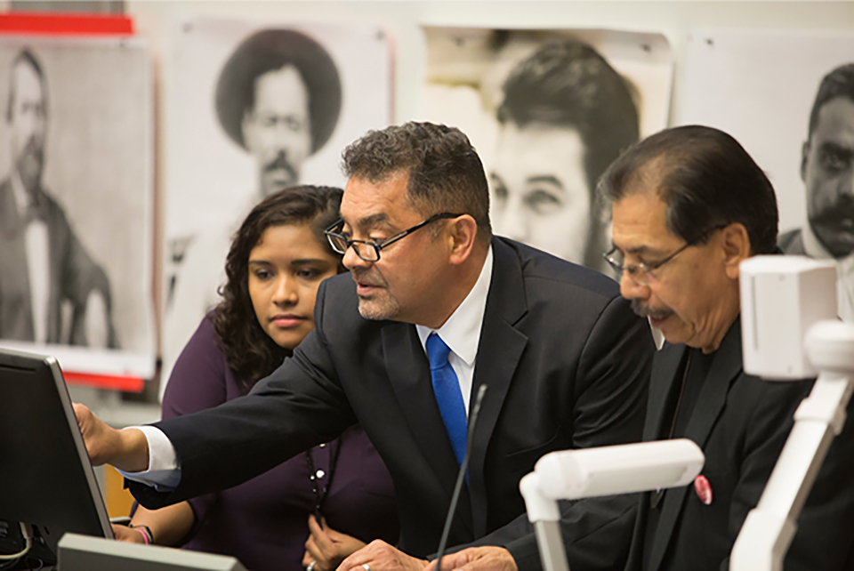 The UTRGV Department of Sociology & Anthropology and the Department of Criminal Justice on Friday, March 23, hosted a conference to honor fallen Chicano activists. “Chicanx Movement Activist Conference: Encuentro” honored leaders like Cesar Chavez and Rodolfo “Corky” Gonzalez, whose portraits, along with political posters, lined the wall in the auditorium of the Science Building on the Edinburg Campus where the conference was held. The event was organized by Dr. José Villarreal (at right), UTRGV sociology lecturer and former activist. At center is guest speaker Abel Orendain, a McAllen lawyer and son of renowned local civil rights leader Antonio “Tony” Orendain. (UTRGV Photo by Silver Salas)