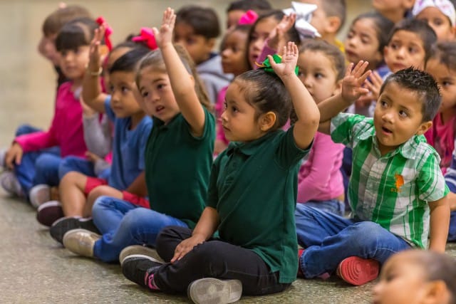 Students at Brownsville Independent School District's Morningside Elementary raise their hands for a chance to ask questions to three authors promoting literacy at their school as part of the Reading Rock Stars program on Thursday, March 1. The Texas Book Festival sent authors to Morningside Elementary and four other Rio Grande Valley elementary schools as part of UTRGV’s FESTIBA, the Festival of International Books and Art, happening through March 3.