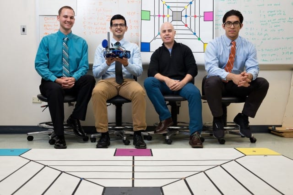 The UTRGV Robotics team – (from left) students Samuel Roberts and Joshua Acosta, Dr. Mounir Ben Ghalia, and UTRGV student Salvador Garza.