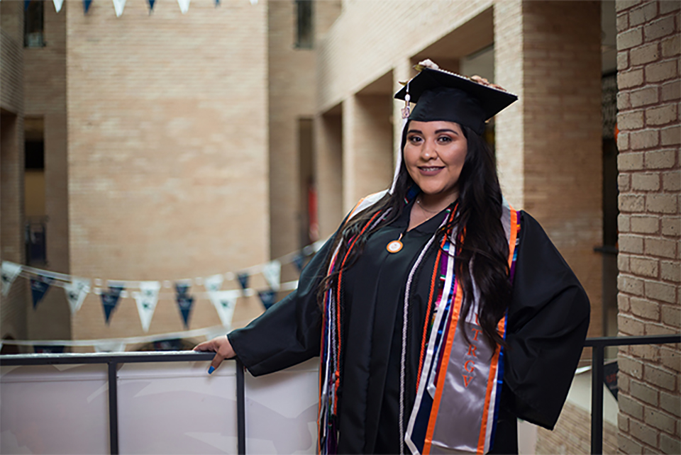 Maria ‘Lupita’ Neyra, a mass communications major from Los Fresnos, says she will share her UTRGV Memory Stole with her parents, to honor the support they provided throughout her time in college. (UTRGV Photo by Silver Salas)