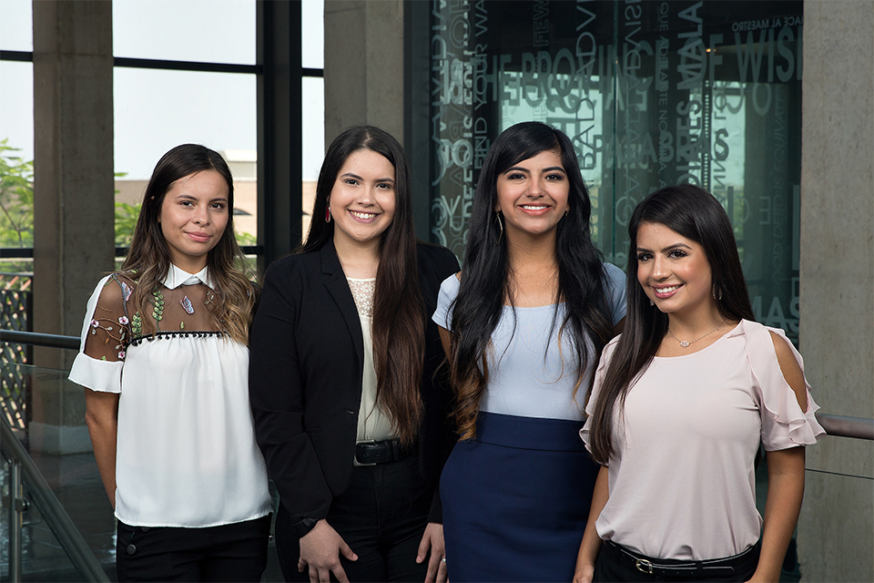 UTRGV education students (from left) Jimena Gamboa of La Feria, Clarissa Rodriguez of Weslaco, Kasandra Salinas of La Feria, and Clarissa Guerra of Edinburg, are among the seven UTRGV students named recipients of the Charles Butt Scholarship for Aspiring Teachers, under the Raise Your Hand Foundation. For this inaugural cohort, 100 students from 10 partnering universities in Texas were chosen from a pool of 350 candidates by means of a competitive selection process, which included a written application, interviews, group activities and demonstration of a teaching lesson. Each student receives an $8,000 scholarship each year for up to four years, as well as ongoing training, mentorship and networking opportunities facilitated by the Raise Your Hand Texas Foundation. Not shown are recipients Raquel Perez of Edinburg, Brenda Olvera of Brownsville, and Cristina Ortiz of Laredo. (UTRGV Photo by Paul Chouy)