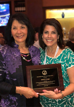 Dr. Selma Yznaga (at right), associate professor of counseling at The University of Texas Rio Grande Valley, has been awarded the 2018 Kitty Cole Human Rights Award by the Association for Multicultural Counseling and Development. Pictured at the award ceremony are Yznaga and colleague Dr. Patricia Arredondo, special advisor to the dean for Academic Affairs at Fielding Graduate University, who nominated Yznaga for the award. (Courtesy Photo)