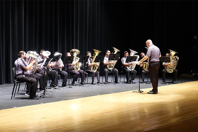 Dr. Lorne (William) O’Neil, professor of clarinet in the School of Music, UTRGV College of Fine Arts and students on stage