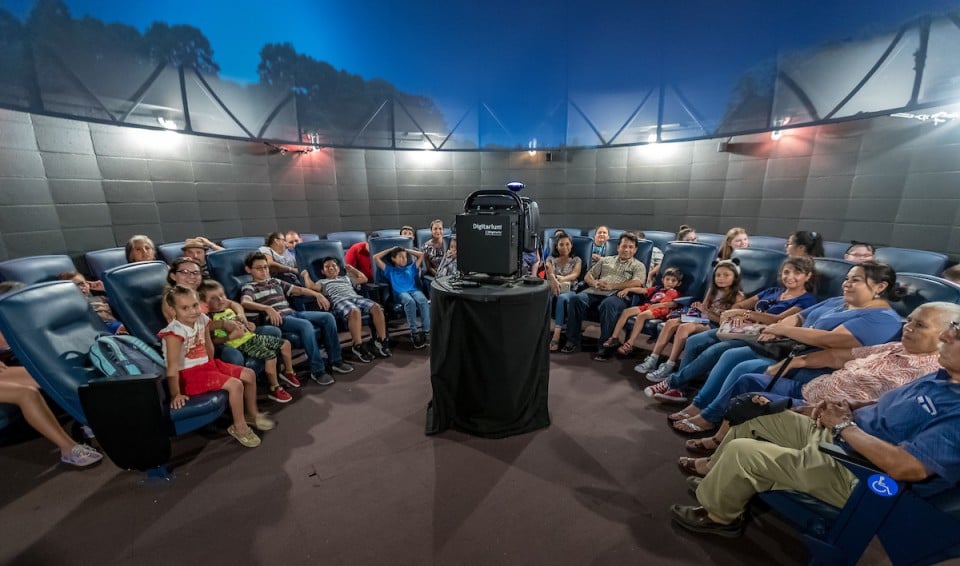 About 500 stargazers and space aficionados visited the UTRGV H-E-B Planetarium on the Edinburg Campus to catch a glimpse of Venus, Jupiter, Mars and Saturn – and the moon – on July 25, during a special community event hosted by the university, and with the participation of community leaders Dr. John Gerling from Gerling Orthodontics in McAllen, and H-E-B, which provided free hotdogs, chips, snacks and drinks during the event. Visitors had the chance to see planets and stars up close through the university’s high-powered telescopes. There were several short films about space presented inside the Planetarium, and a special lecture by Gerling, which included an “explosion” using warm water and liquid nitrogen. (UTRGV Photo by David Pike)