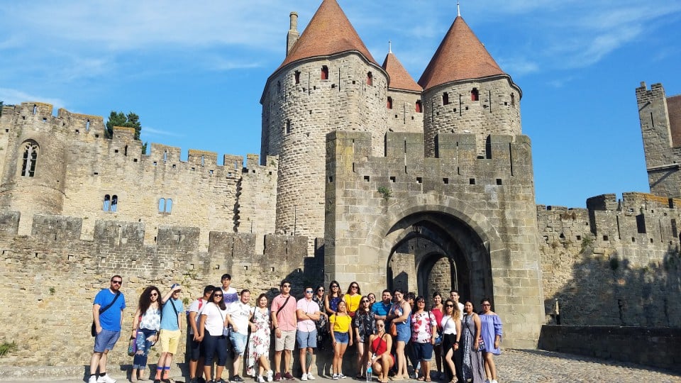 UTRGV Students become immersed in the culture and language of Spain. Students standing in front of castle.