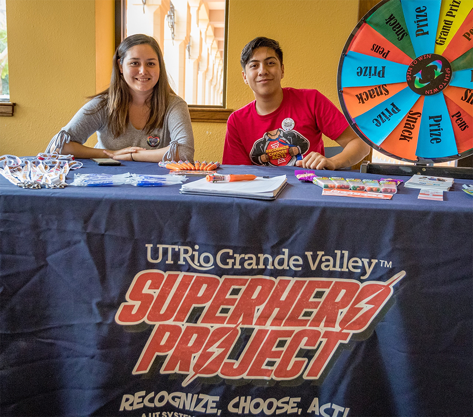 The UTRGV Superhero Project, aimed at creating a safer campus, has been given the Best Practices/Institutional Impact Award from the National Behavioral Intervention Team Association. The project is an active bystander program designed to encourage students to look out for one another. To help spread the word, peer leaders – like Ceilhy Garcia and Mario Flores, shown here – make presentations to groups, host events, partner with other UTRGV departments and participate in events hosted by other organizations. (UTRGV Photo by David Pike)