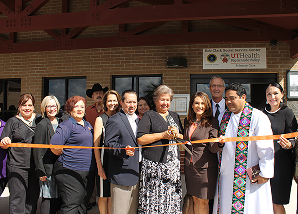 The UTRGV School of Medicine celebrated the grand opening of its second Area Health Education Center on Thursday, Oct. 4, in the Bob Clark Social Service Center in Cameron County. The School of Medicine received a five-year, $3.75 million grant from the U.S. Department of Health and Human Services’ Health Resources and Services Administration to develop the three AHECs, which will offer free healthcare to residents and educational opportunities for students enrolled in UTRGV’s health professions programs. Pictured from left are: UTRGV School of Medicine AHEC Manager Christie Cantu; UTRGV School of Medicine Senior Director of Clinical Operations Dr. Linda Nelson; Martha Cramer, director of Centro Cultural, Cameron County and AHEC at Bob Clark Community Advisory Board member; UTRGV Deputy President Dr. Janna Arney; Cameron County Judge Eddie Treviño; Cameron County Commissioner Sofia Benavides; UTRGV Vice President for Governmental and Community Relations Veronica Gonzales; UTRGV School of Medicine Senior Associate Dean for Community Health Partnerships and AHEC Program Director Dr. John Ronnau; Father Ricardo Chavez Flores, San Diego de Guadalupe Catholic Church, and Mary Esther Sorolo, Justice of the Peace, Cameron County. (Courtesy Photo)