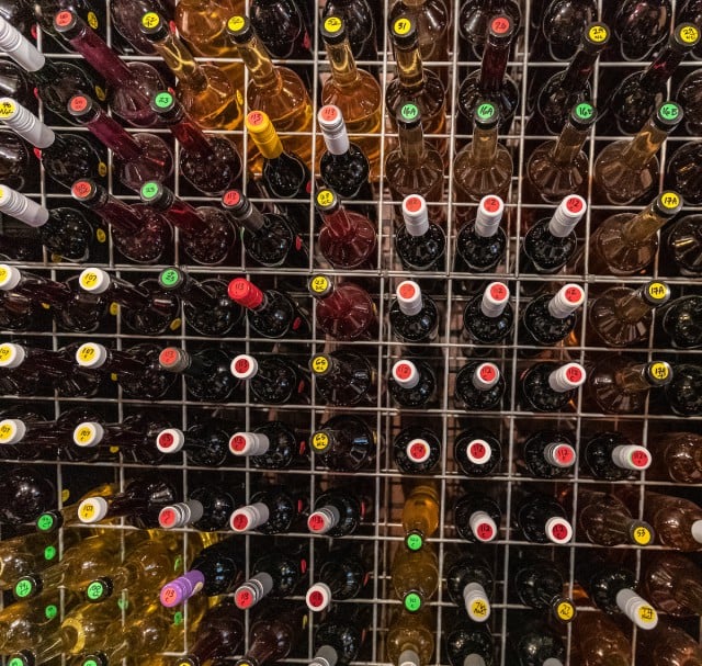 Various bottles of wine being tested by researchers at UTRGV