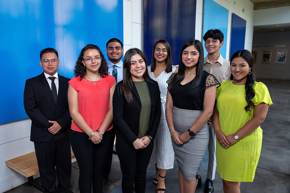 The second cohort of Charles Butt Scholarship for Aspiring Teachers, under the Raise Your Hand Texas Foundation, includes 11 recipients from UTRGV. Shown here are eight of the UTRGV recipients, at the UTRGV Education Complex on the Edinburg Campus – (from left) Gaspar Garcia, Diana Salas, Roger Juarez, Theresa Garza, Patricia Fuentes, Lariza Vazquez, Robert Torres and Keyla Ochoa. A total of 134 new scholars were selected and are committed to teaching in majority economically disadvantaged Texas public schools or in hard-to-fill subject areas. Each will receive an $8,000 scholarship annually for up to four years, as well as ongoing training, mentorship and networking opportunities provided by the foundation. (UTRGV Photo by Paul Chouy)