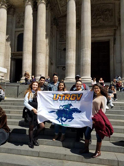 UTRGV Study Abroad students stand on the steps of St. Paul’s Cathedral in London, England, proudly displaying the UTRGV banner. (Courtesy Photo)