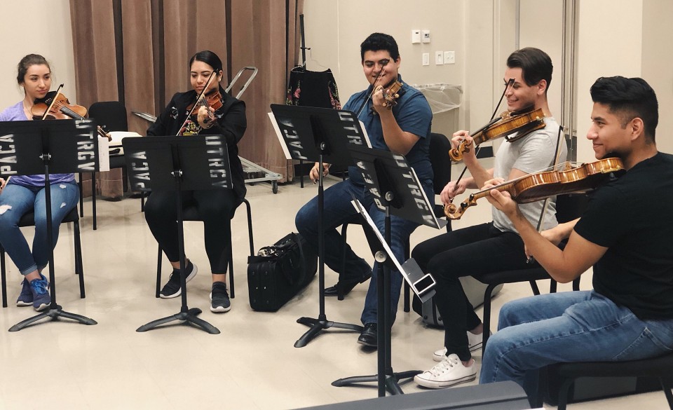 he UTRGV Mariachi Aztlán rehearsing in studio.