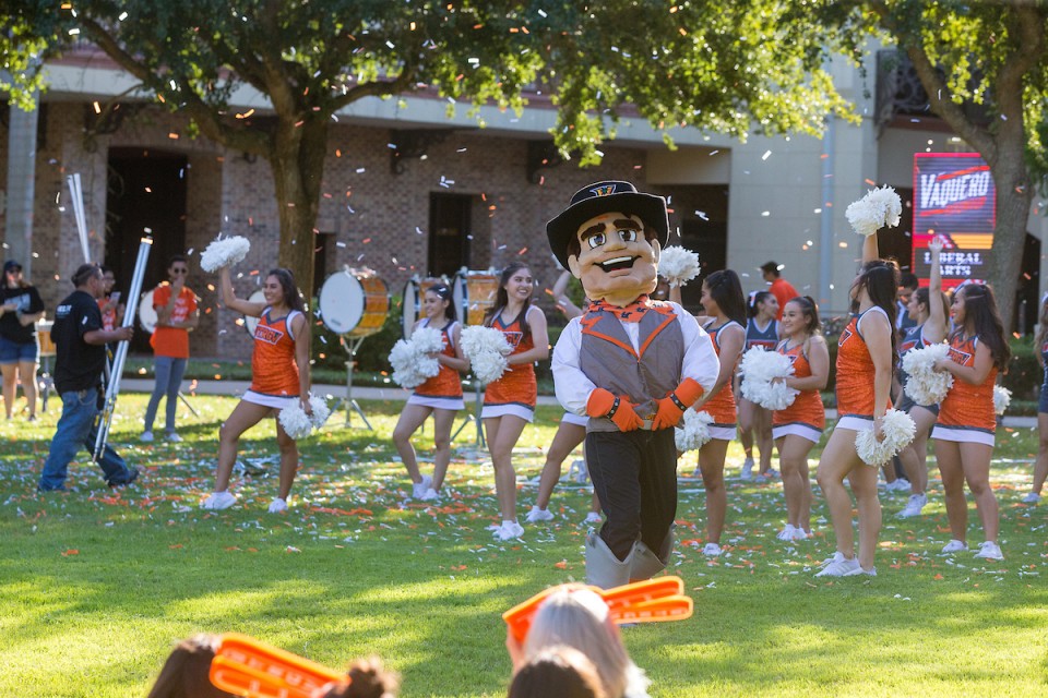 Students meet the Vaquero mascot on RoundUp day