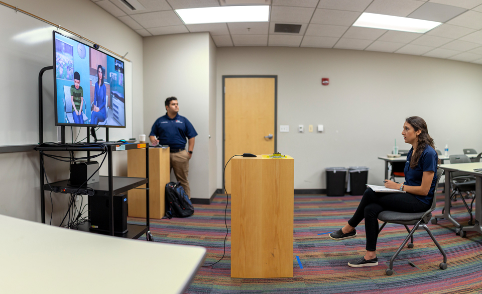 UTRGV Department of Occupational Therapy clinical assistant professors Dr. Roel Garcia and Dr. John Luna recently utilized the College of Education and P-16 Integration’s Mixed-Reality Simulation (MRS) software to create “real-life” clinical scenarios in pediatrics for their graduate students. Twenty-four students participated in the MRS sessions Sept. 26-27 in the Education Complex on the UTRGV Edinburg Campus. The purpose was to help students build their interviewing skills with clients before they started their fieldwork. (UTRGV Photo by Silver Salas)