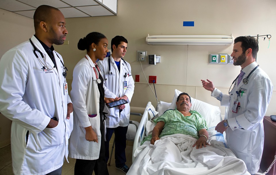 UTRGV internal medicine residents visit with a patient