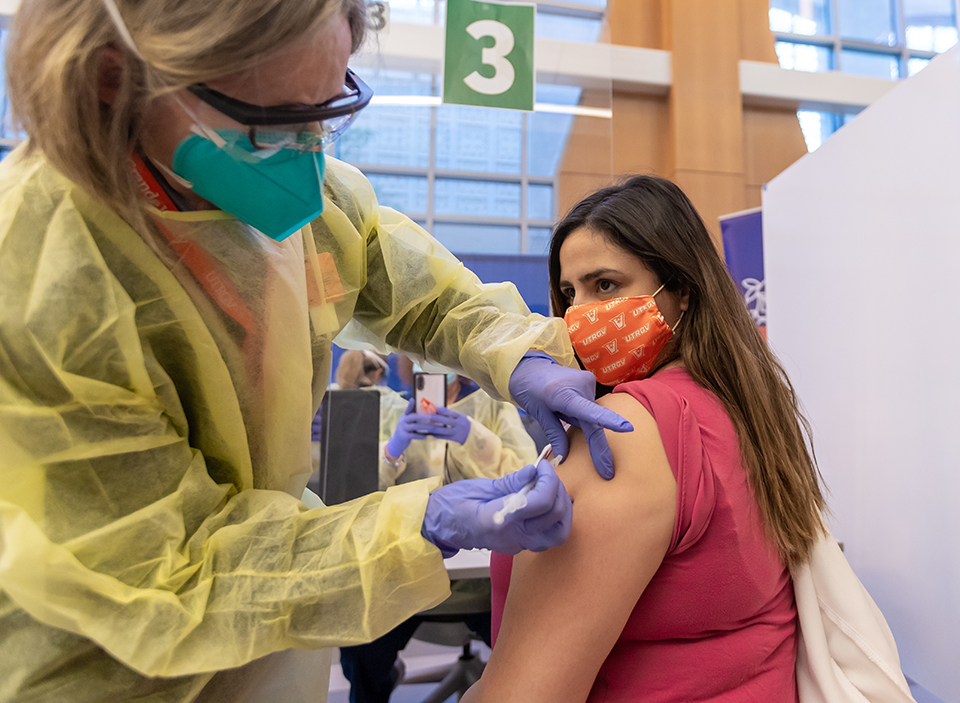 Dr. Michelle Lopez, UTRGV School of Medicine associate program director and assistant professor of Internal Medicine, was the first person to receive the long-awaited COVID-19 vaccine not only at UTRGV, but in the entire Rio Grande Valley. Lopez received the vaccine on Tuesday, Dec. 15, after UTRGV received a shipment of 1,950 COVID-19 vaccines. The shot was administered by Dr. Linda Nelson, a Doctor of Nursing Practice (DNP), RN, pediatric nurse practitioner, and senior director of Clinical Operations for the UTRGV School of Medicine and UT Health RGV. (UTRGV Photo by David Pike)