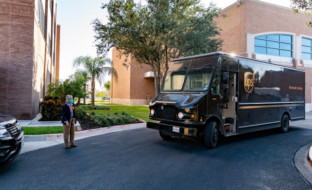 UPS truck delivering COVID-19 vaccine