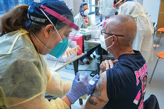 Esteban Gonzalez, a lieutenant with the the Pharr Fire Department, received the COVID-19 vaccine Saturday, Dec. 19, 2020, at the UTRGV School of Medicine’s Medical Education Building on the Edinburg Campus. (UTRGV Photo by Paul Chouy)