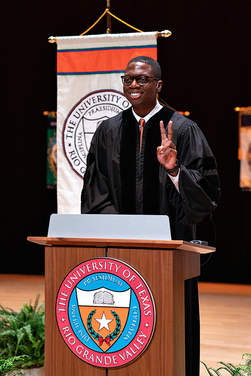 Keynote speaker Patrick Ojeaga, a fourth-year medical student at the UTRGV School of Medicine who was appointed by Texas Gov. Greg Abbott to serve as the first student regent from UTRGV, shares a few words of encouragement with the Class of 2020 on Saturday, Dec. 12. (UTRGV Photo by Paul Chouy)