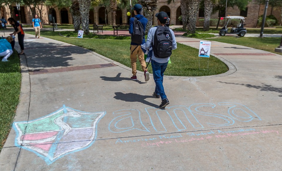 AMSA logo chalk drawing on sidewalk