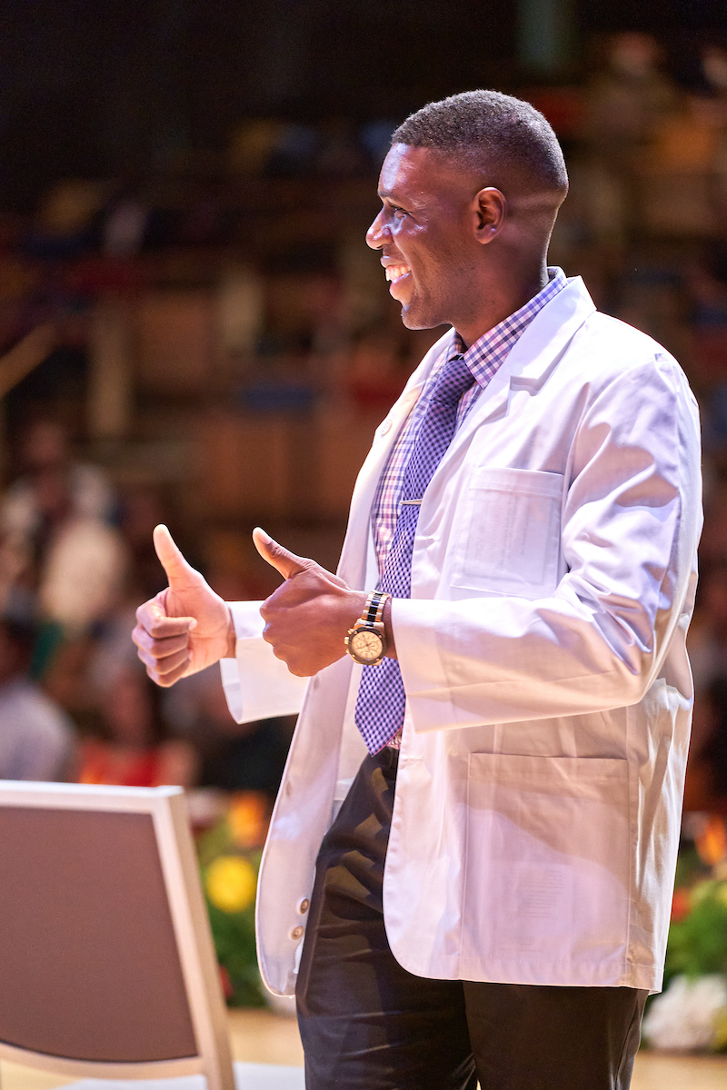 A member of the UTRGV School of Medicine Class of 2025 gives the thumbs up as he celebrates the special day that marks the beginning of his medical school journey. (UTRGV Photo by David Pike)