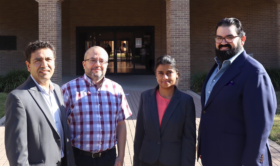 From left, Dr. Erwin Suazo, PI and Associate Professor of Mathematical and Statistical Sciences, Dr. Tamer Oraby, SMSS Associate Professor and Co-PI, Dr. Hansapani Rodrigo SMSS Assistant Professor and NSF REU mentor, and Dr. Josef Sifuentes SMSS Assistant Professor and Mentor.