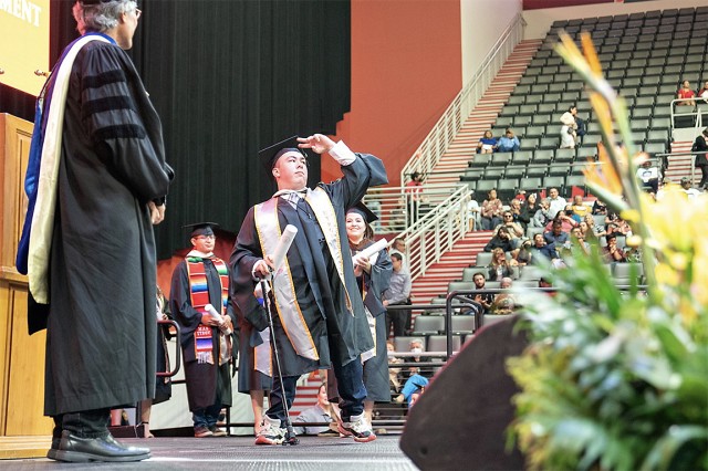 UTRGV graduate saluting