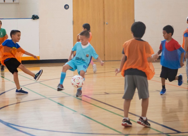 Children playing soccer