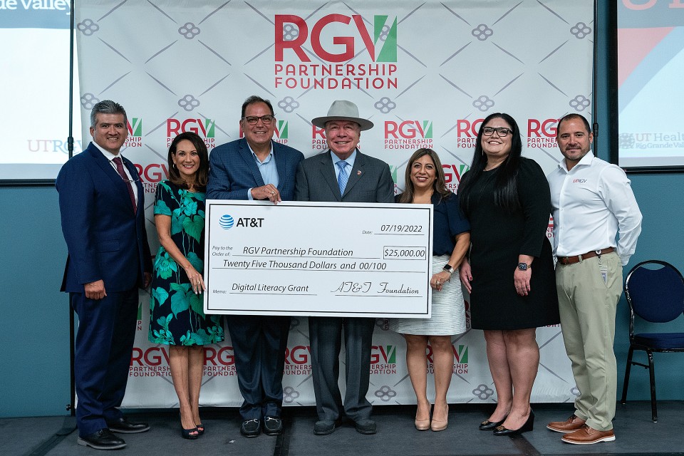 The UTRGV Small Business Development Center and the university’s Entrepreneurship and Commercialization Center will collaborate with the RGV Partnership to teach basic digital literacy to area business owners. On July 19, the AT&T Foundation awarded a $25,000 grant to fund the trainings which are scheduled to start in mid-August. From left to right are Sergio Contreras, president and executive director for the RGV Partnership; Veronica Gonzales, senior vice president for UTRGV Governmental and Community Relations; JD Salinas, AT&T External & Legislative Affairs vice president; Juan "Chuy" Hinojosa, state senator for District 20; Linda Ufland, director of UTRGV Entrepreneurship, Innovation and Commercialization; Marivel Mata, business advisor for UTRGV Small Business Development Center; and Ron Garza, UTRGV associate vice president for Workforce and Economic Development. (UTRGV Photo by Paul Chouy)