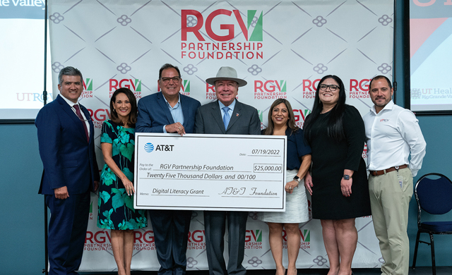 The UTRGV Small Business Development Center and the university’s Entrepreneurship and Commercialization Center will collaborate with the RGV Partnership to teach basic digital literacy to area business owners. On July 19, the AT&T Foundation awarded a $25,000 grant to fund the trainings which are scheduled to start in mid-August. From left to right are Sergio Contreras, president and executive director for the RGV Partnership; Veronica Gonzales, senior vice president for UTRGV Governmental and Community Relations; JD Salinas, AT&T External & Legislative Affairs vice president; Juan "Chuy" Hinojosa, state senator for District 20; Linda Ufland, director of UTRGV Entrepreneurship, Innovation and Commercialization; Marivel Mata, business advisor for UTRGV Small Business Development Center; and Ron Garza, UTRGV associate vice president for Workforce and Economic Development. (UTRGV Photo by Paul Chouy)