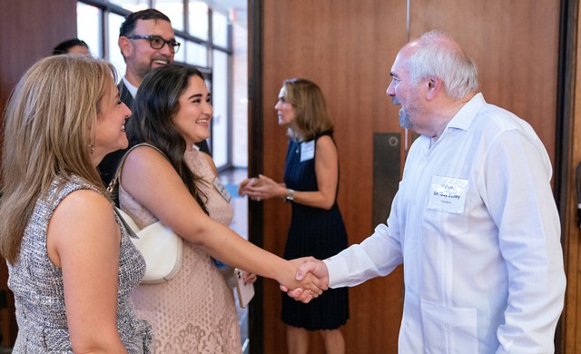 UTRGV President Guy Bailey greets Alma Rodriguez, a Luminary Scholar, and her family at a banquet on Monday, Aug. 22, welcoming the first cohort of the unique program.