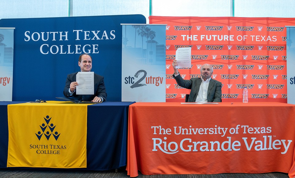 STC President Ricardo Solis and UTRGV President Guy Bailey celebrate the partnership, called "STC 2 UTRGV," during the signing ceremony.