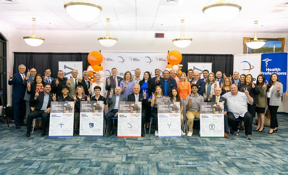 UTRGV and South Texas ISD administrators and representatives celebrate the new collegiate partnership for STISD students who will be able to take college courses through UTRGV while they are still in high school.
