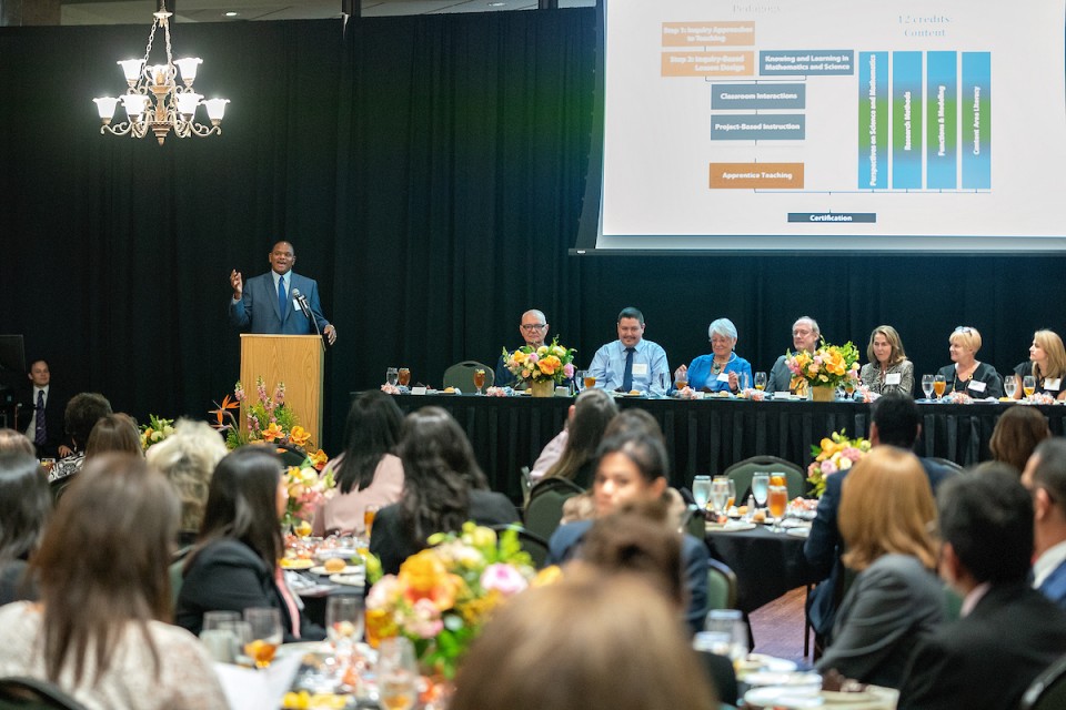 Dr. Chris Smith, a chemistry professor, and co-director and program manager with the College of Sciences for the UTRGV UTeach program, shares the impact the program has had on students and the Rio Grande Valley community over the last 10 years during a banquet held Thursday, Oct. 6, in Edinburg.