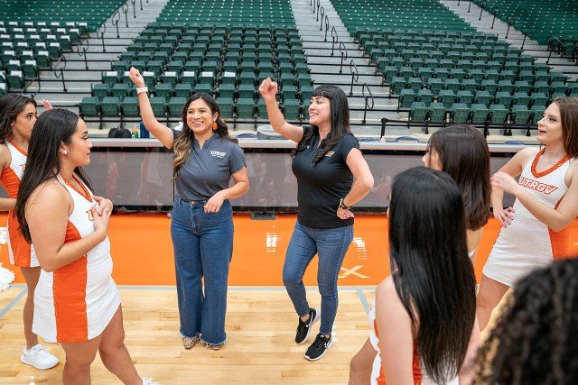 Isela Gomez, head coach of UTRGV Spirit Programs, and Olympia De Leon, dance coach, oversee rehearsal on Friday, Oct. 28, 2022 at the Fieldhouse in Edinburg, Texas.