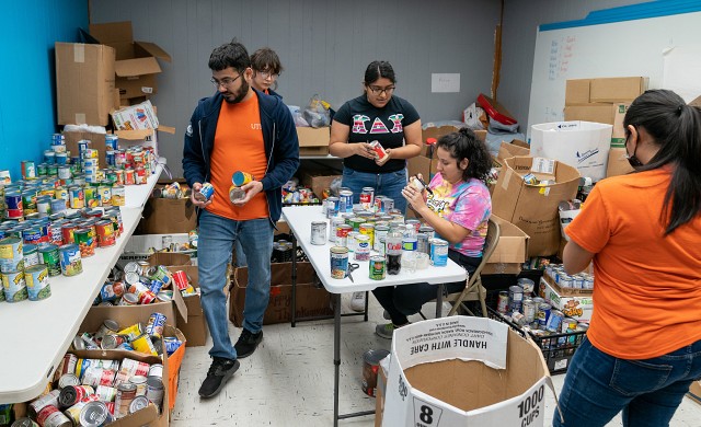 UTRGV students lend a helping hand and sort food donations at the Good Neighbor Settlement House in Brownsville on Monday, Jan.16, as part of MLK Day of Service activities across the Rio Grande Valley.