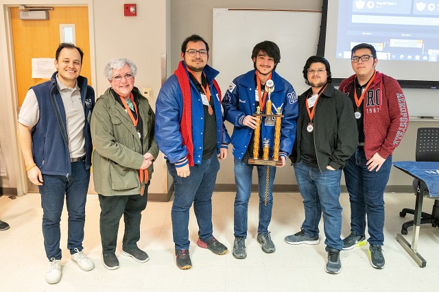 The Veterans Memorial High School team with the 3rd place trophy at the UTRGV Regional Science Bowl 2023